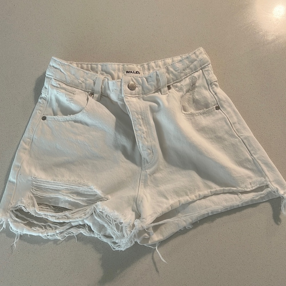 white Rolla’s shorts.